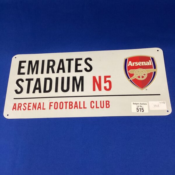 Vintage Arsenal Football Club tin plate sign with Emirates Stadium branding.