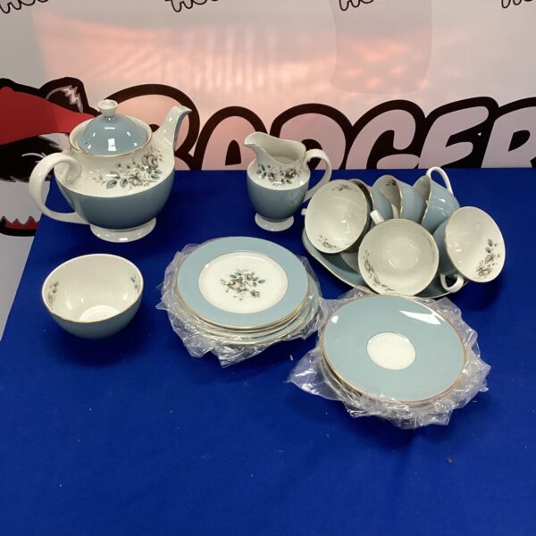Royal Doulton Rose Elegans tea service set on a table.
