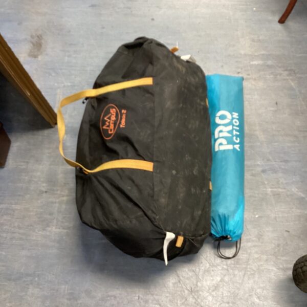 Grey and blue Campus Toledo 2 person camping tent rolled up.