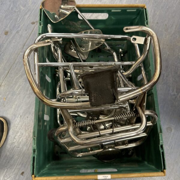 Vintage scooter luggage racks and mirrors in chrome.