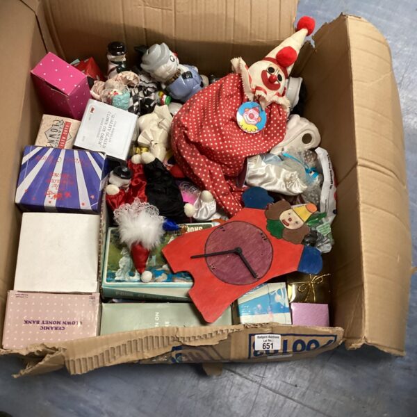 Vintage clown collectibles lot with figures and ephemera.