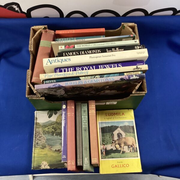 Stack of antique books on jewellery, pottery and antiques.