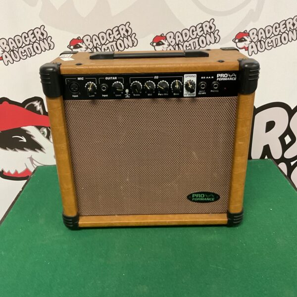 Front view of a vintage Pro Formance guitar amplifier.
