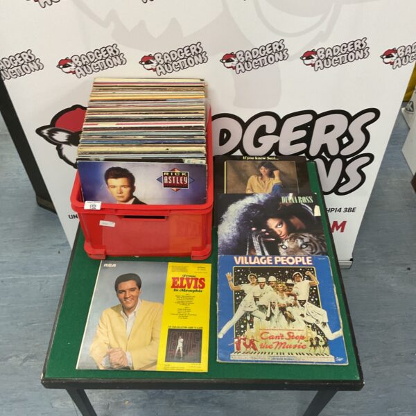 Mixed vinyl record collection with Elvis, Diana Ross and Suzi Quatro.