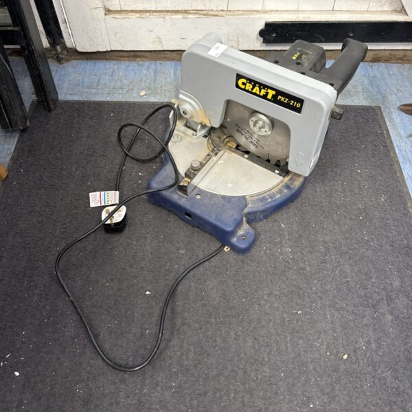 Power Craft PKZ-210 mitre saw for woodworking and DIY projects.