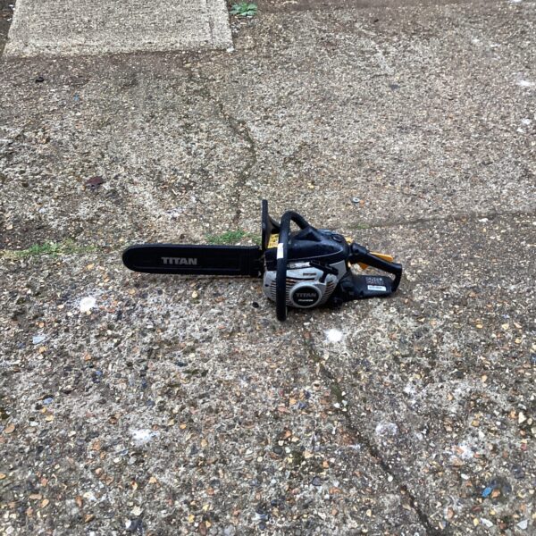 McCulloch Titan chainsaw, a petrol-powered garden tool for sale.