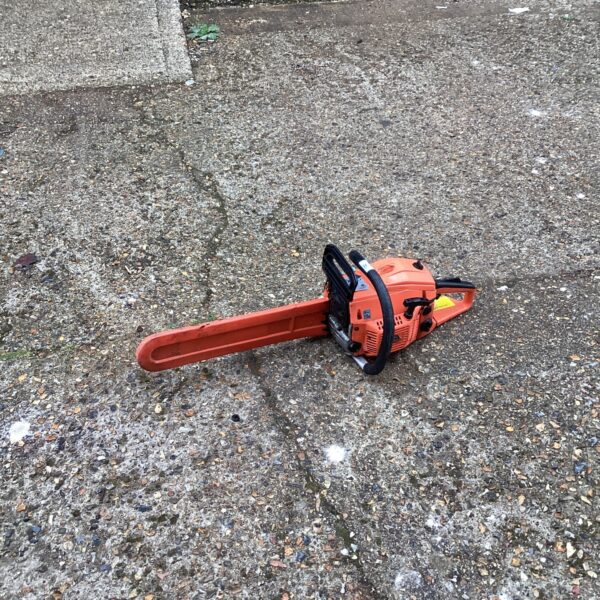 Vintage Tarus chainsaw in used condition, ideal for restoration.