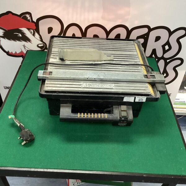 Used Plasplugs tile cutter for DIY tiling projects.