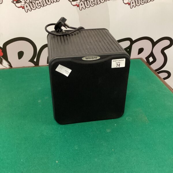 Front view of vintage Velodyne Microvee sound system.