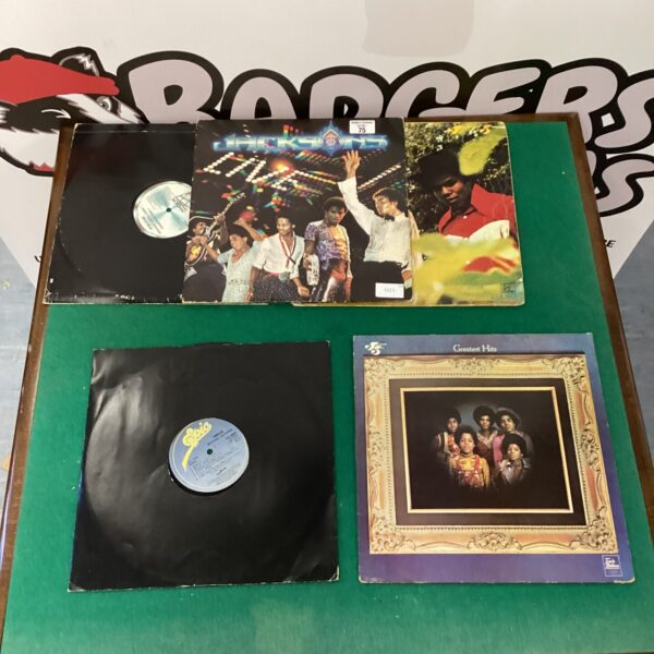 Jackson 5 vinyl record lot with Michael Jackson thriller album.
