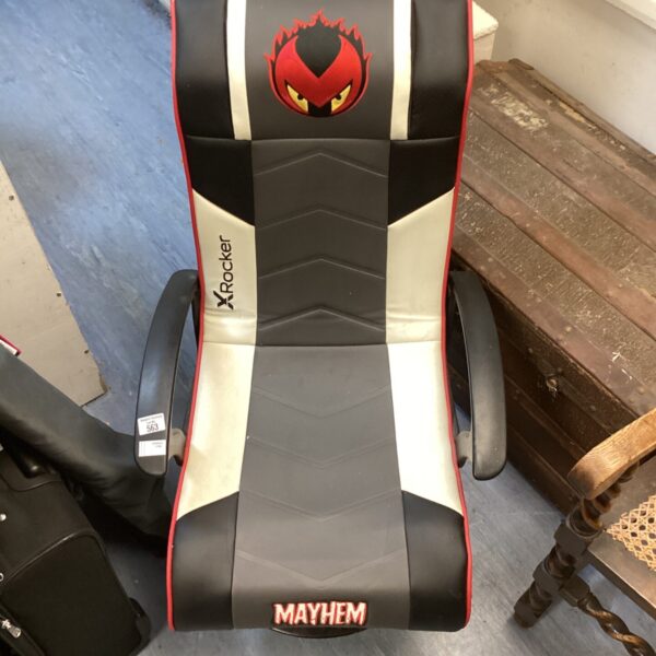 Red and black Xrocker gaming chair for immersive video game experiences.