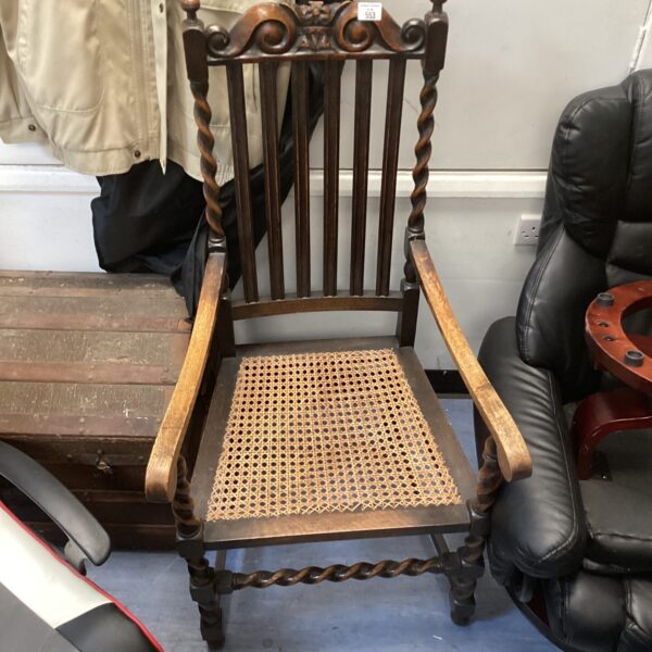 Vintage barley twist chair with woven rattan seat.