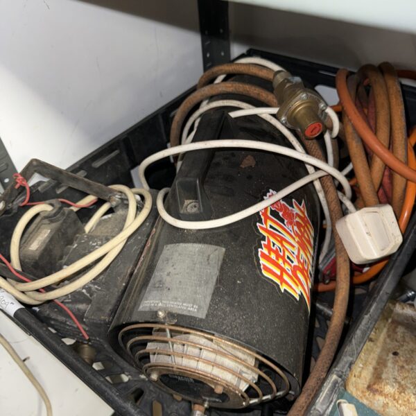 Vintage Heat Demon space heater for garage or workshop use.
