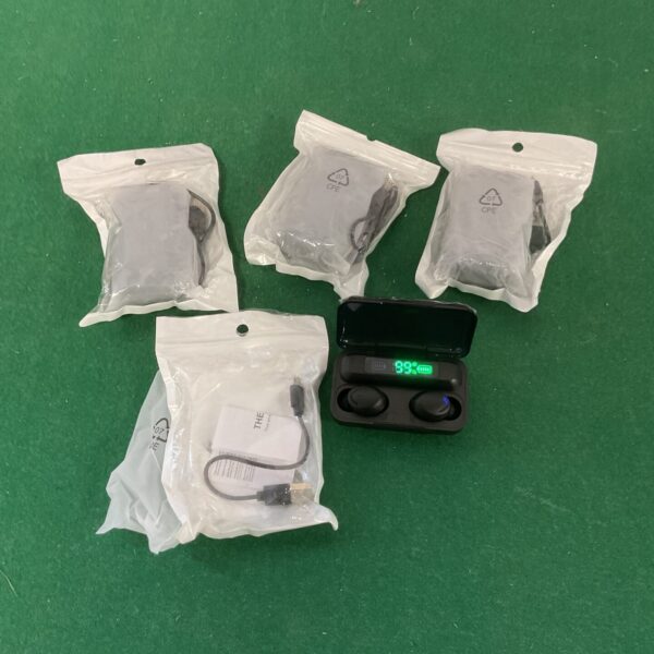 Lot of four pairs of new true wireless earbuds in packaging.