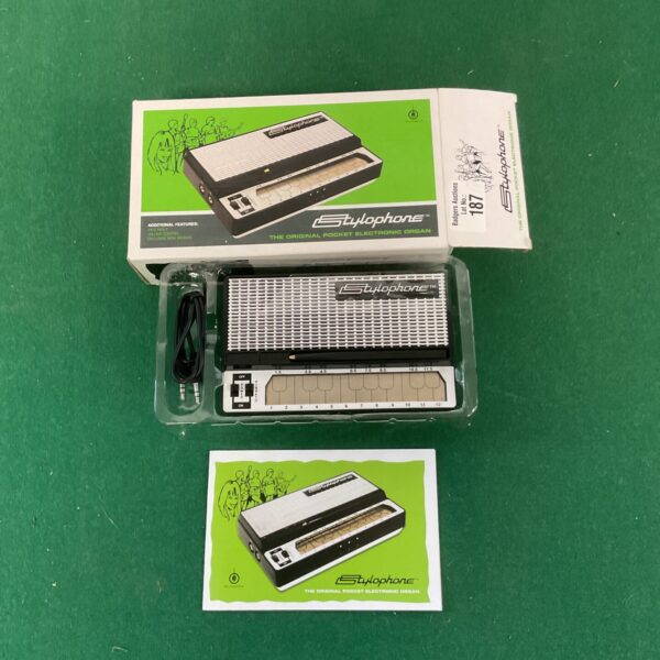 Vintage Stylophone pocket organ, a classic 1970s electronic instrument.