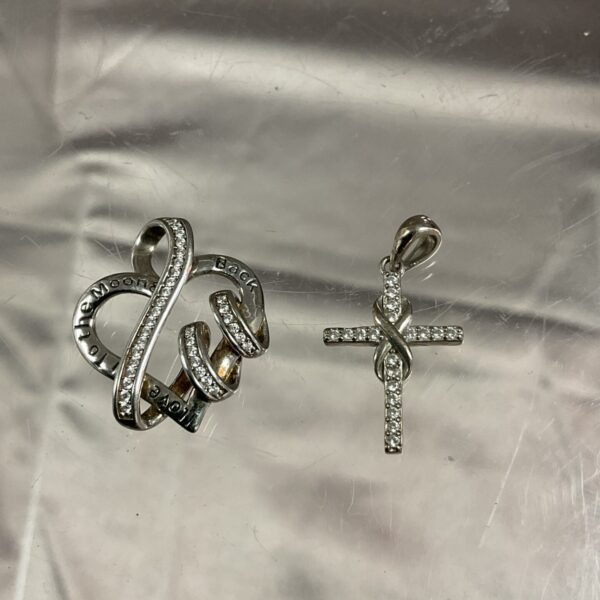Silver Alex Perry cross pendant, designer jewellery.