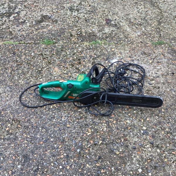 Used Black and Decker electric chainsaw for garden and DIY tasks.