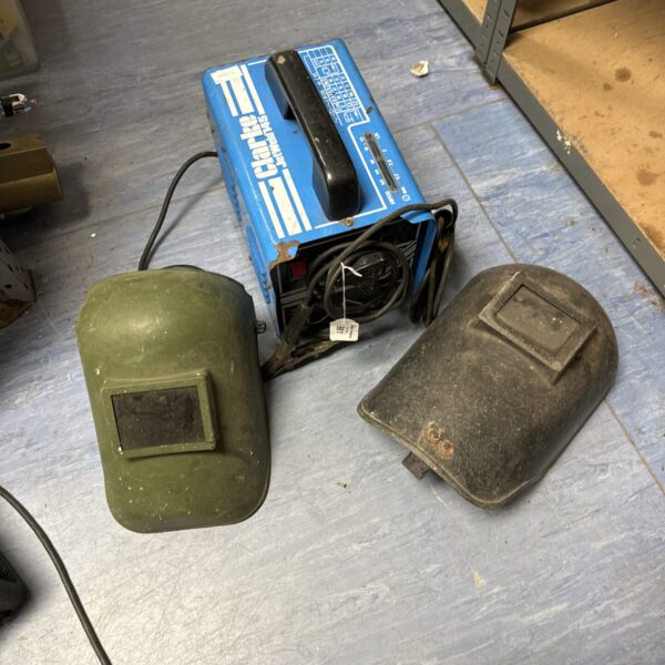 Vintage Clarke Jetweld 145 arc welder with welding masks.