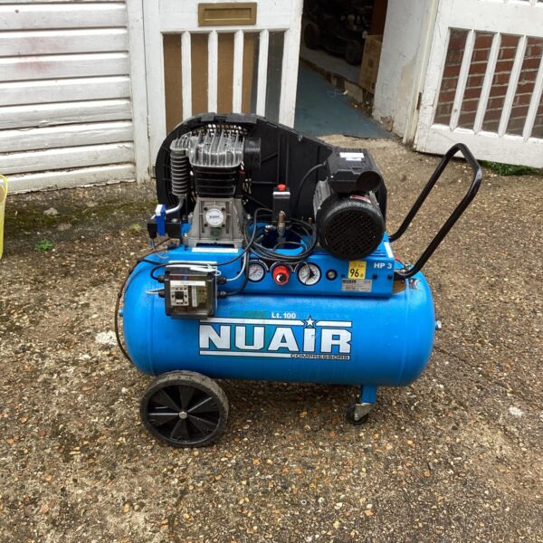 Blue Nuair compressor with wheels for workshop use.