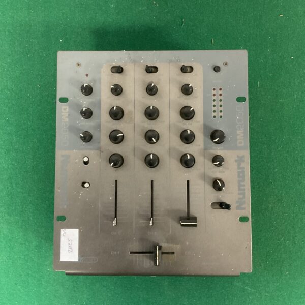 Vintage Numark DM2050 DJ mixer with controls and crossfader.