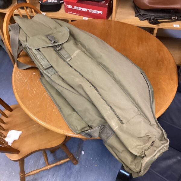 Green Trakker carp rod bag, fishing tackle storage.