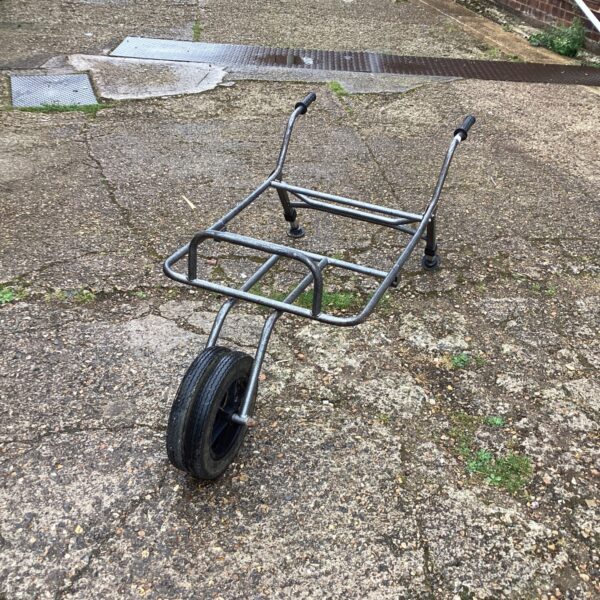 Single-wheeled fishing barrow for transporting angling tackle.