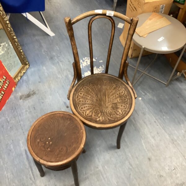 Vintage bentwood chair and stool set with warm wood tones.
