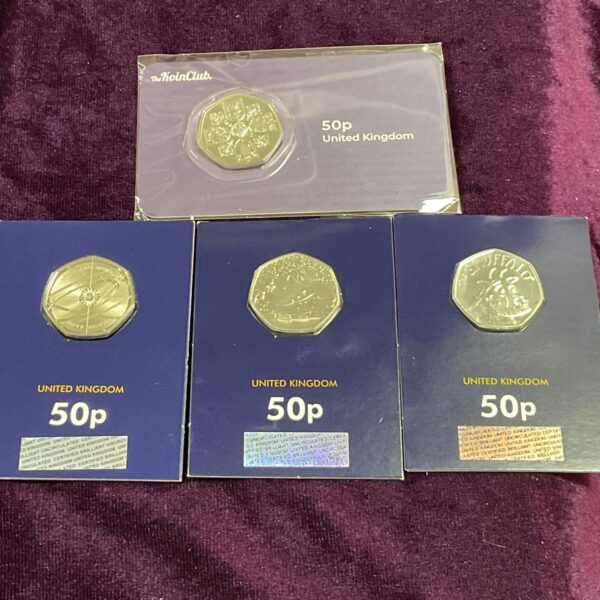 Koin Club 50p coin collection featuring Snowman, Gruffalo, and Newton.