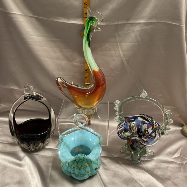 Vibrant Murano glass chicken sculpture with colourful details.