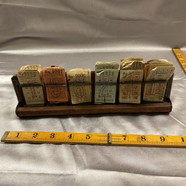 Vintage bus ticket holder with Brighton & Hove tickets inside.