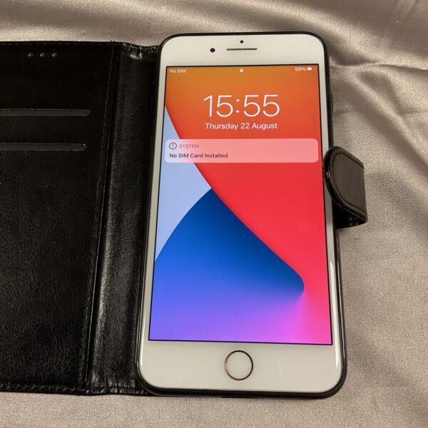 Front view of a used Apple iPhone smartphone with a locked screen.
