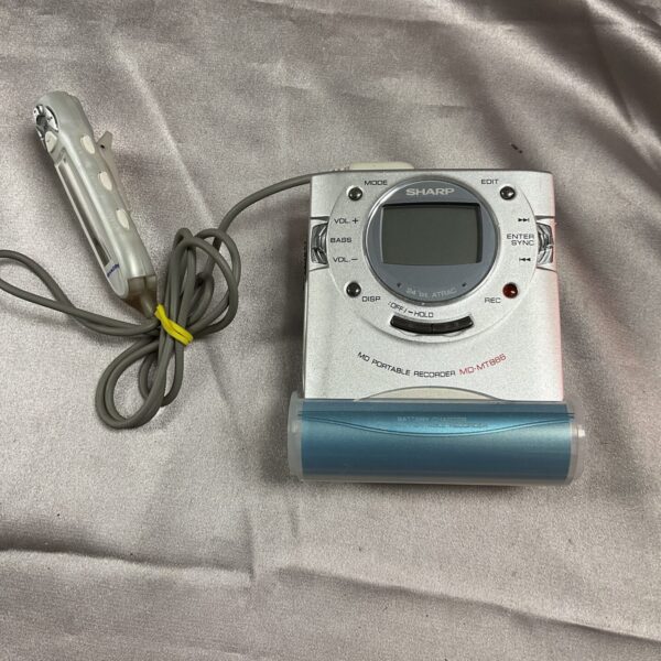 Vintage Sharp MD-MT866 portable mini disc recorder in used condition.