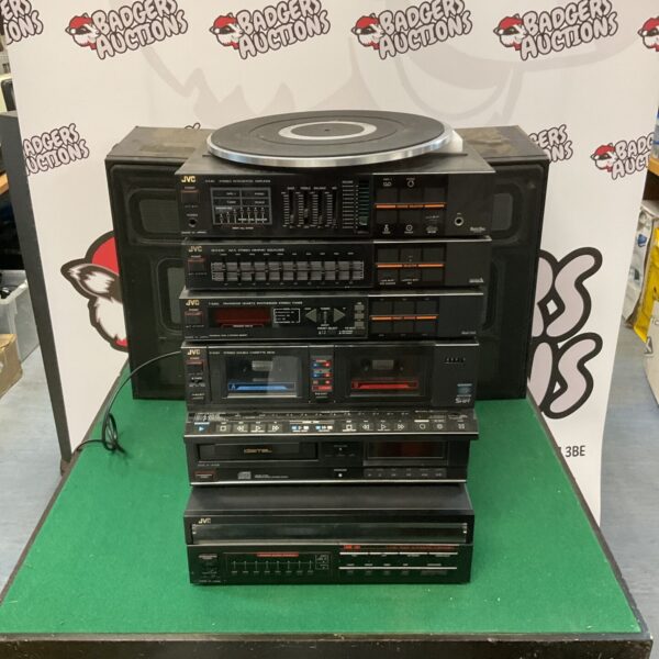 Vintage JVC hi-fi system with turntable, cassette deck, and amplifier.