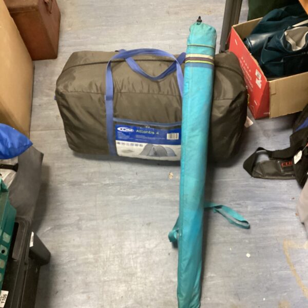Gelert Atlantis 4 man tent with parasol, rolled and secured.