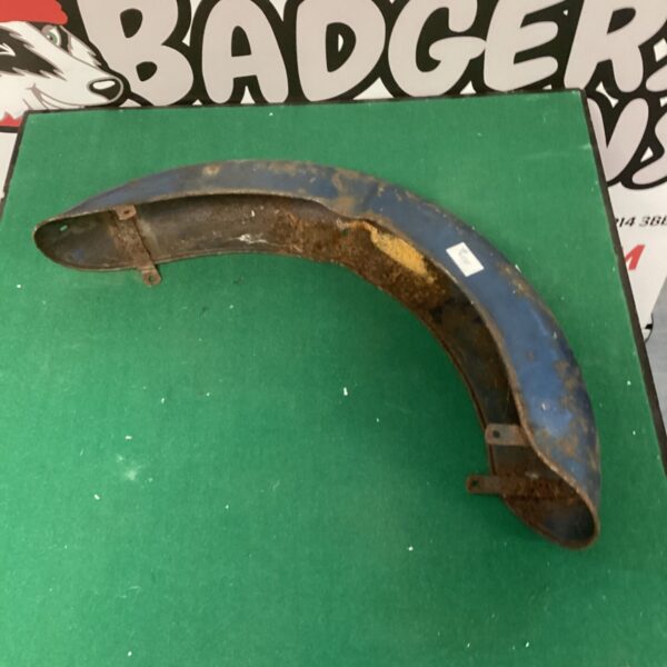 Vintage motorcycle mudguard showing signs of age and wear.