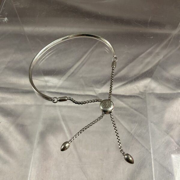 Hallmarked silver bracelet with a lobster clasp, ideal for charms.