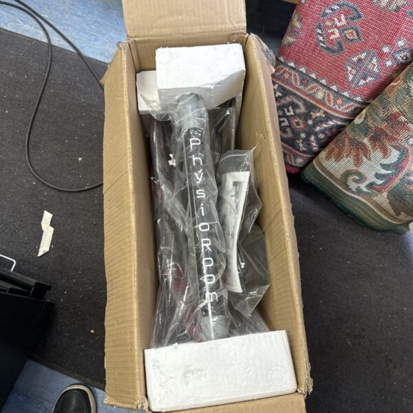 New leg trainer in original box, ready for physiotherapy or fitness.