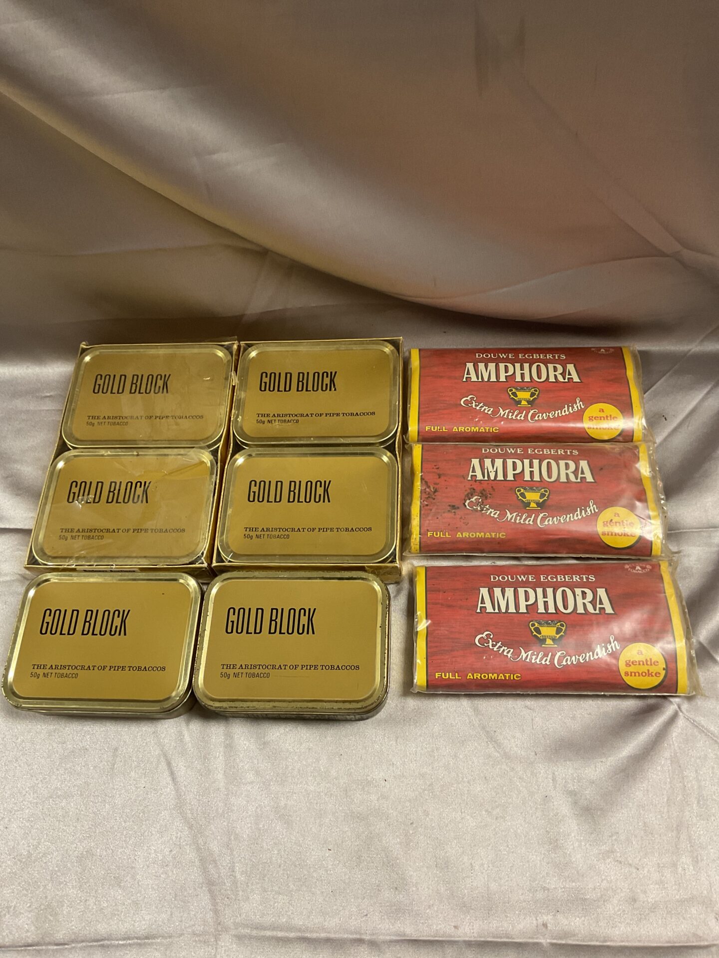 753 Six 50g tins gold block pipe tobacco four tins sealed and three 50g packs of amphora tobacco