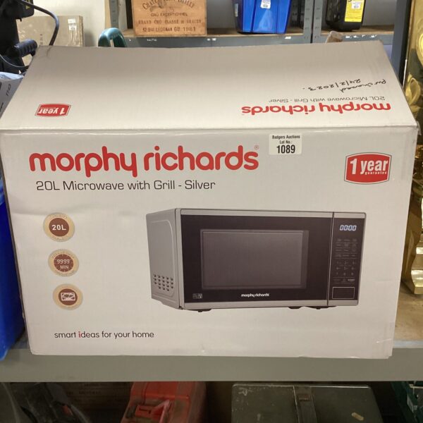 Boxed Morphy Richards 20L microwave with grill function.