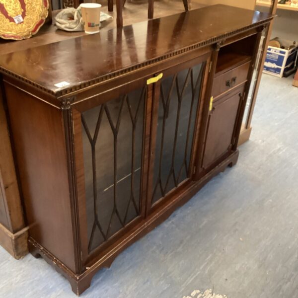 Vintage Darlington mahogany cabinet with glass doors.