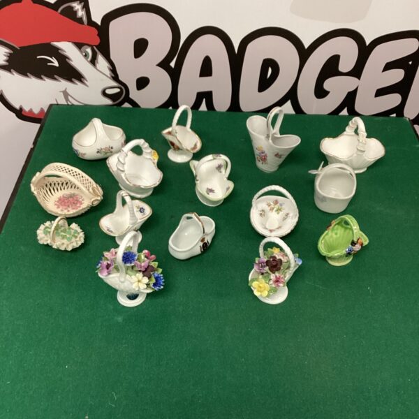 Collection of vintage miniature china baskets, including Royal Doulton.