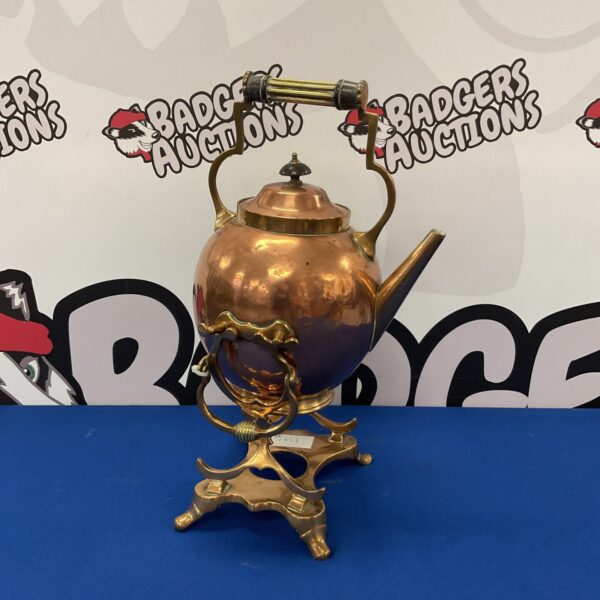 Antique Arts and Crafts copper spirit kettle on stand.