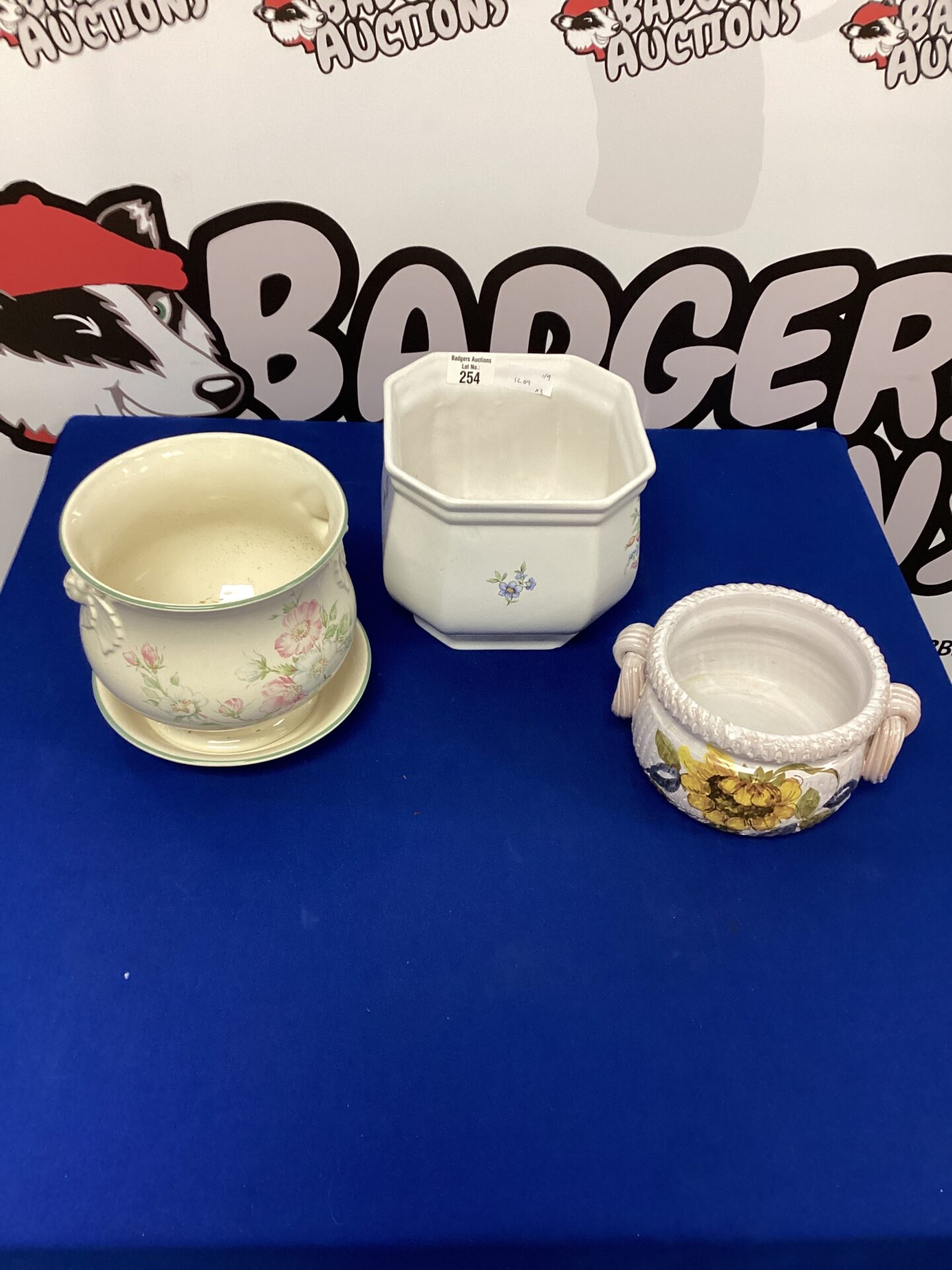 254 Three Porcelain Flower pot holders