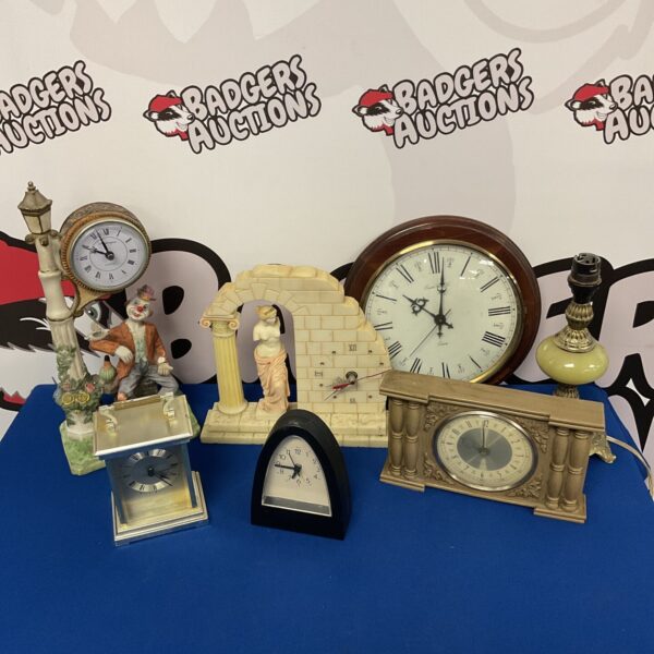 Vintage clock and table lamp collection for antique enthusiasts.