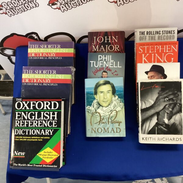 Collection of autobiographies and dictionaries including Keith Richards and Alan Partridge.