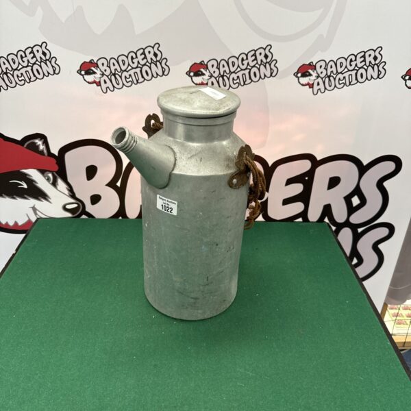Vintage galvanised milk churn with handle, a classic farm collectible.