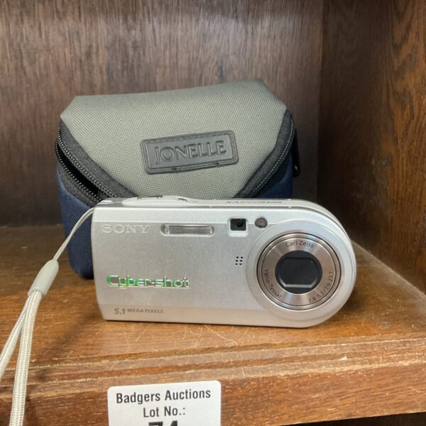 Silver Sony Cybershot DSC-P100 digital camera for collectors.
