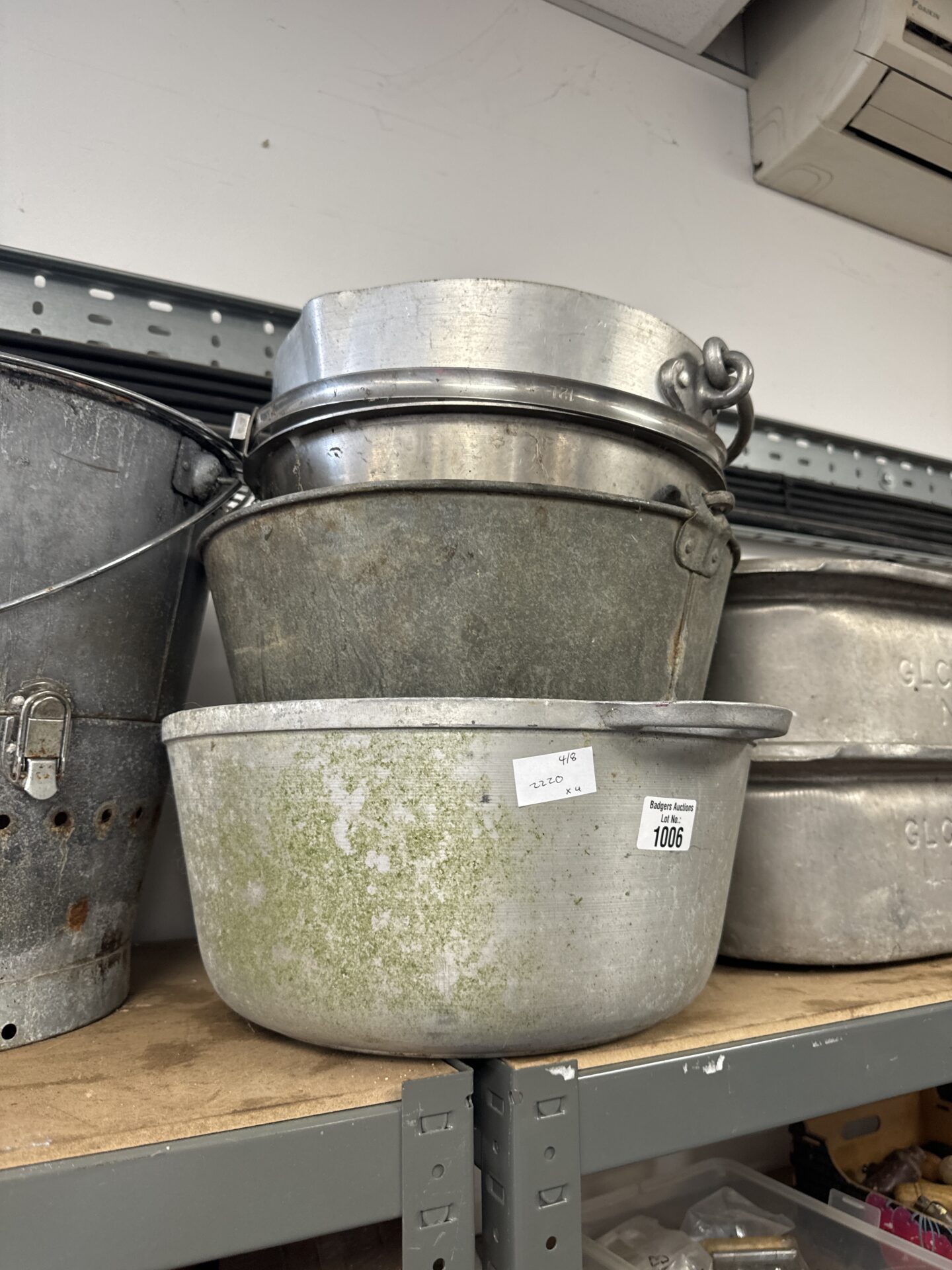 1006 Four large vintage cooking pans