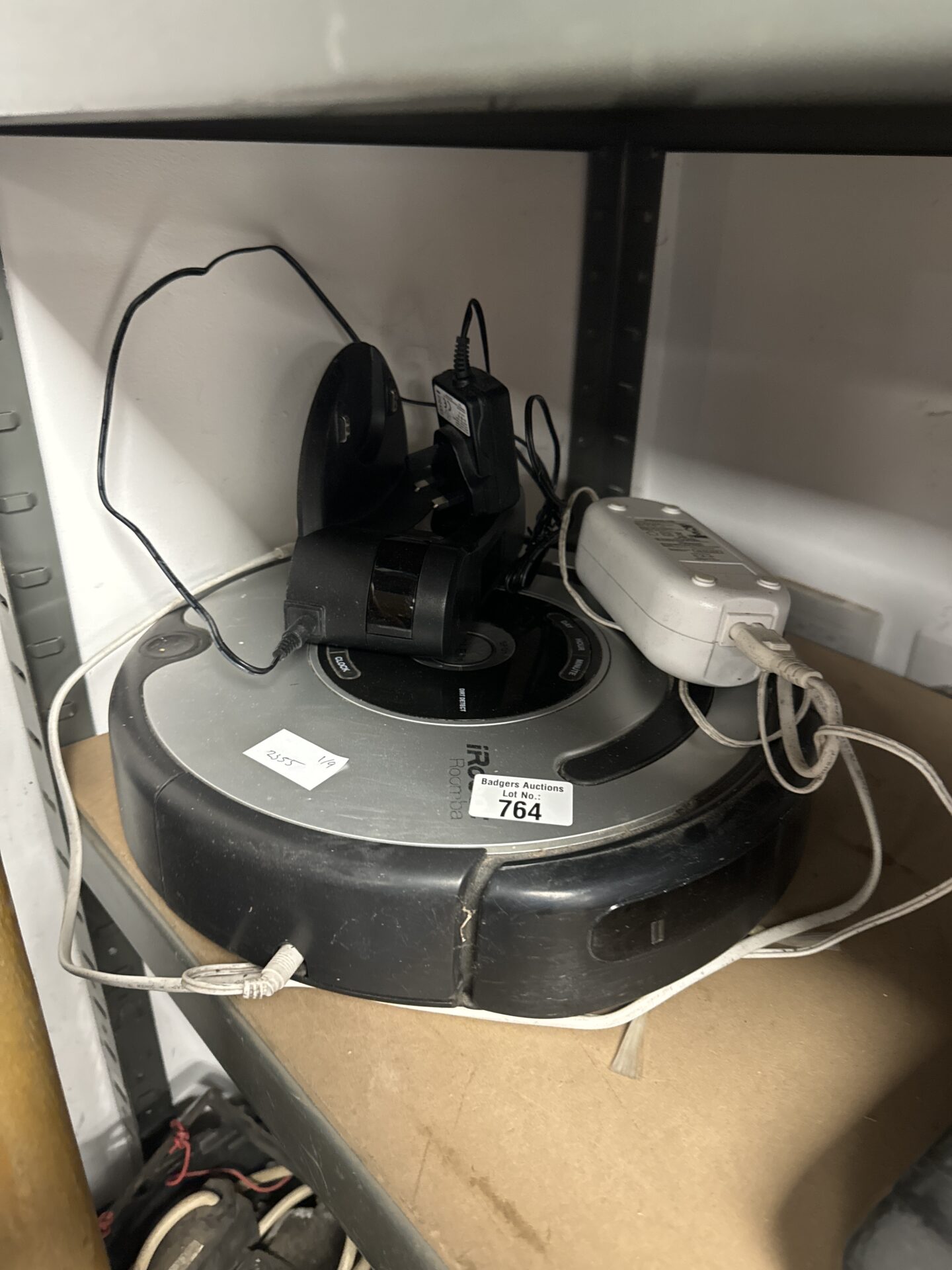 764 Irobot roomba hoover with charger & dock – untested