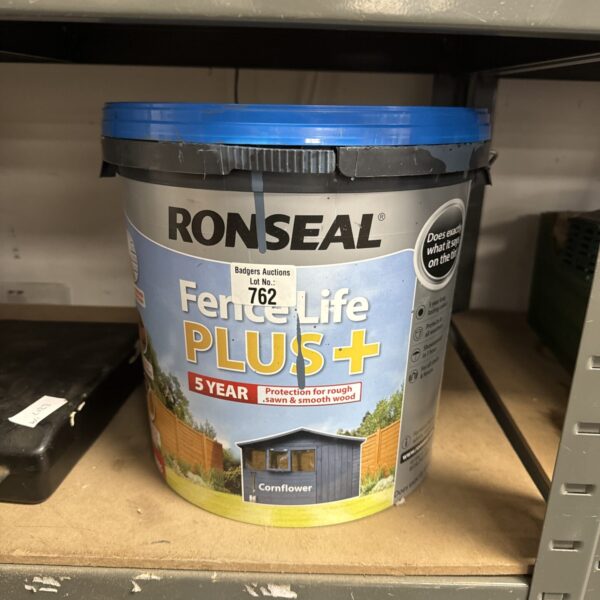 Half-full tub of Ronseal Fence Life Plus cornflower blue garden paint.